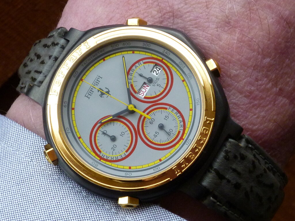 rsz_cartierff-7a38-black-gold-lightgrey-concentricferrarisubdials-greysharkstrap-wristshot-p1201173.jpg